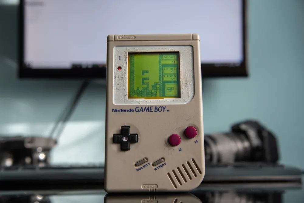 Nintendo Game Boy gaming console with Tetris game on the screen.jpg
